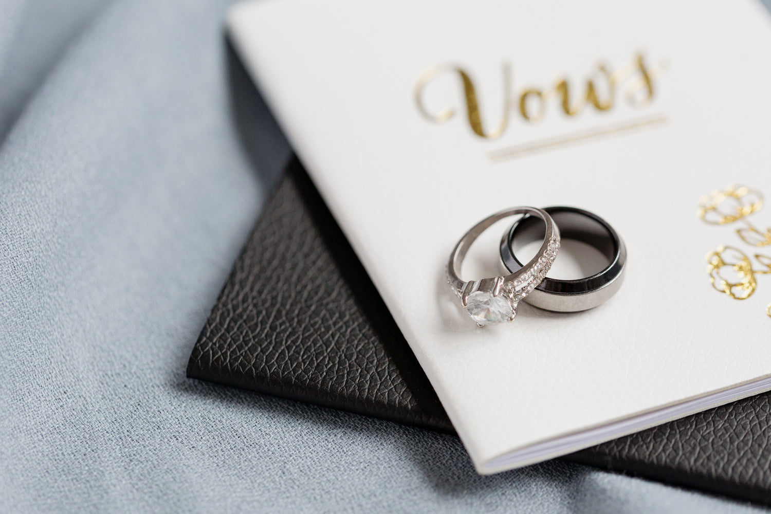 A beautiful set of gold rings. A diamond ring made in white gold for the women, and a white gold wedding band for the men for their special wedding.
